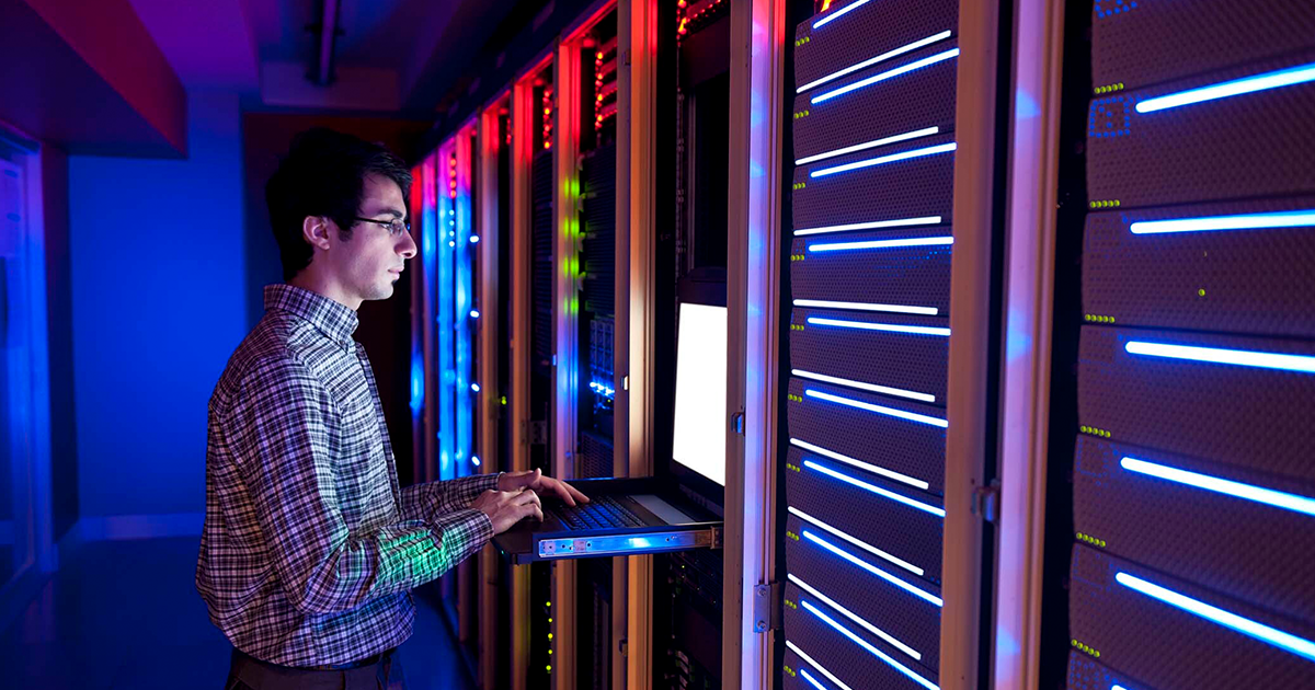 IT professional in a server room IT professional in a server room