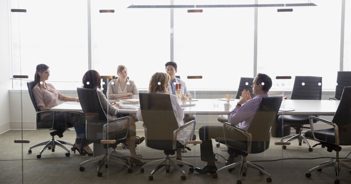 executives in a meeting room executives in a meeting room