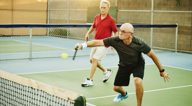 People playing pickleball People playing pickleball