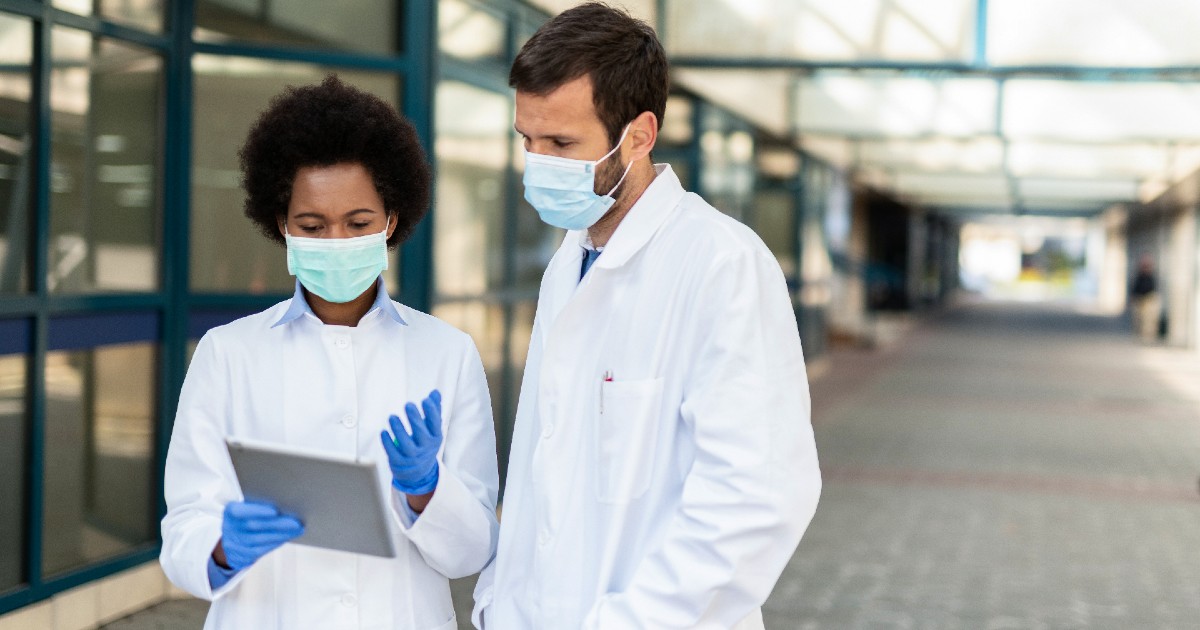 doctors looking at a tablet doctors looking at a tablet