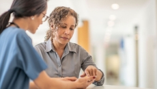 Doctor explains results to patient