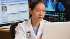 Doctor using computer