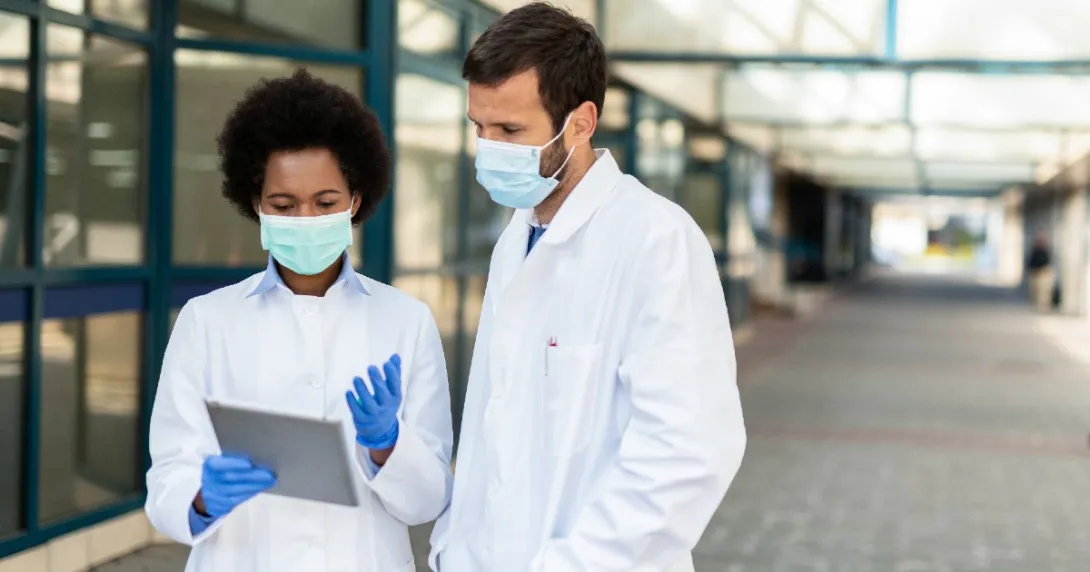 doctors looking at a tablet doctors looking at a tablet
